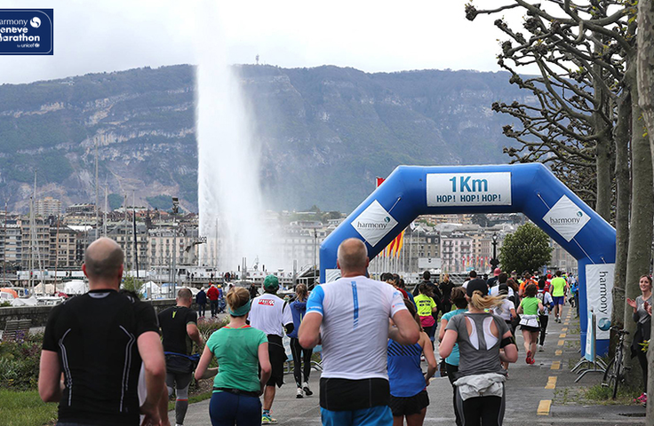 Groupe de coureurs avec vue du Jet d'eau